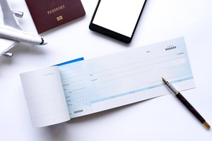 el cheque de viaje