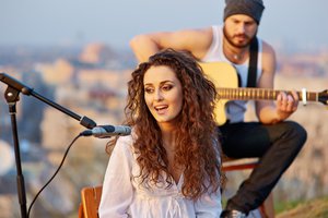 el cantante, la cantante