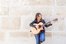 she plays the guitar