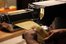 by hand