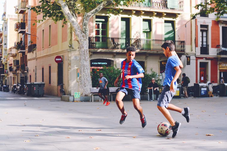 Boys Playing Soccer in Catalonia